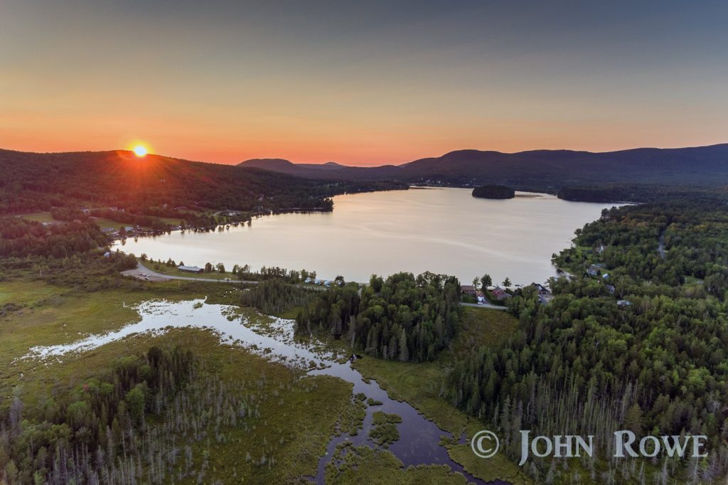 Sun setting on Island Pond, Vermont